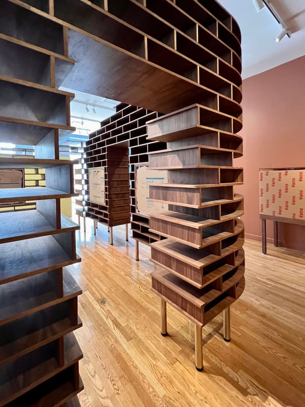 Curved Walnut Exhibition Shelving for the Schomburg Center