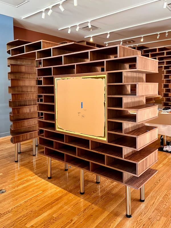 Curved Walnut Exhibition Shelving for the Schomburg Center