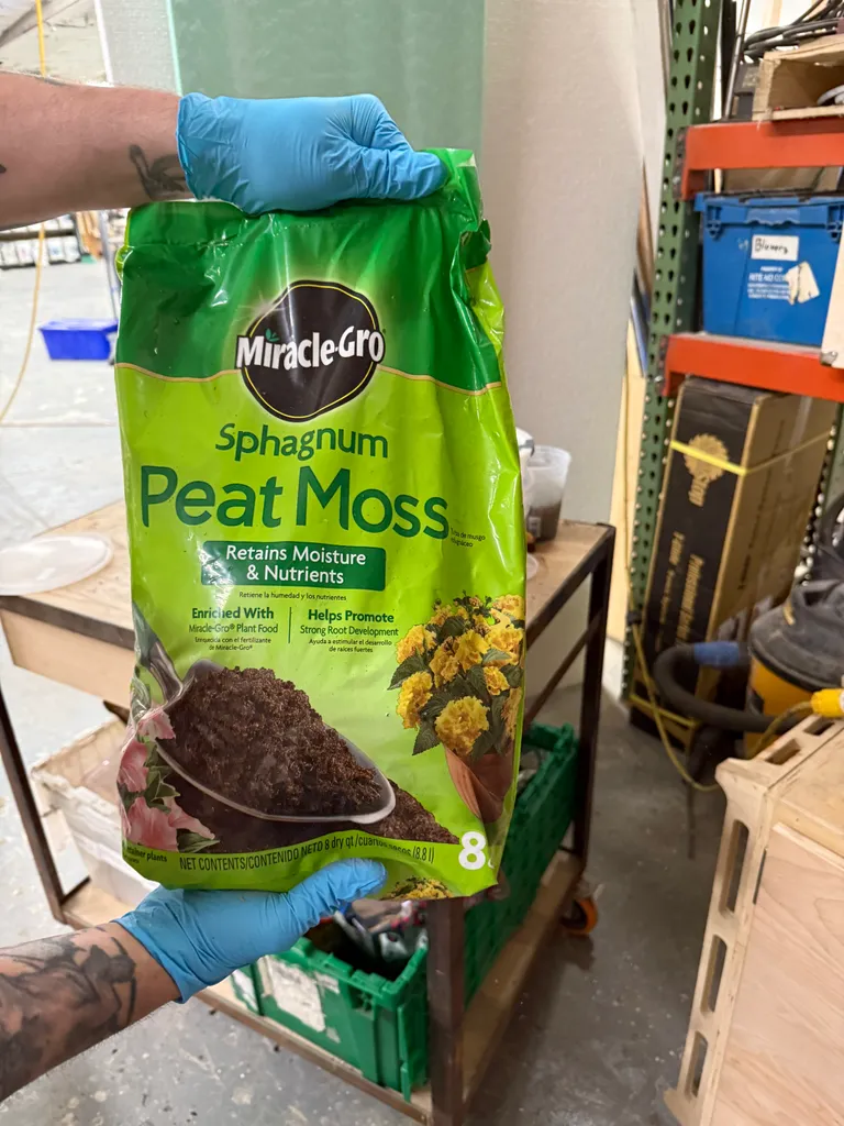 A bag of sphagnum peat moss, one of the soil ingredients