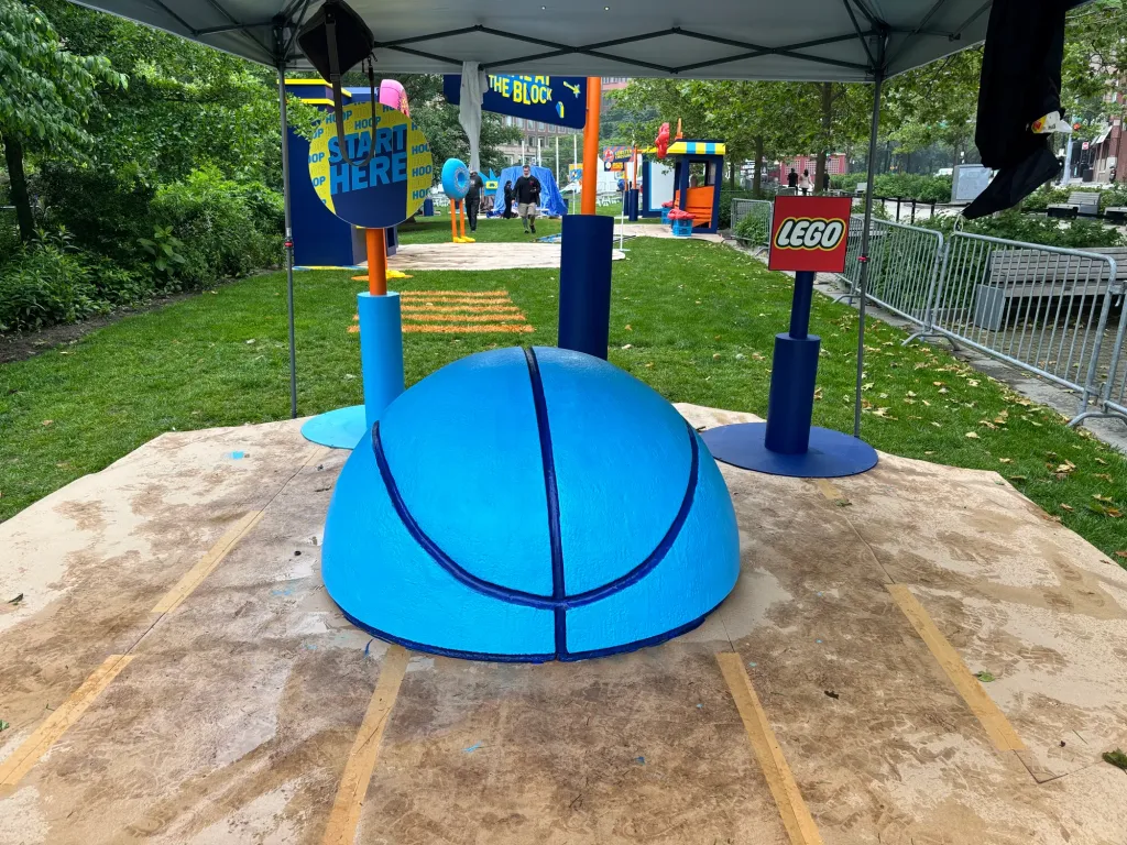 The finished blue basketball dome on site at the entrance to the Block