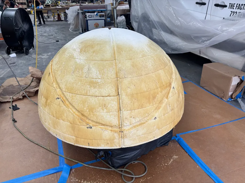 The carved EPS foam basketball dome after hard coating, before paint