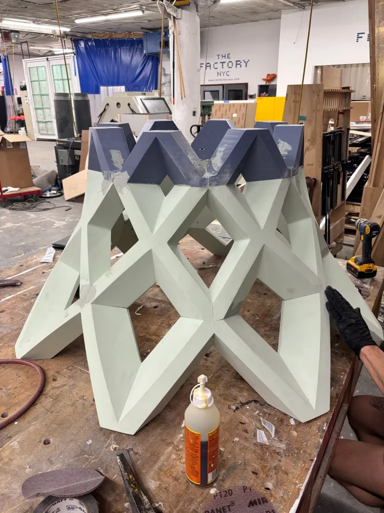 The lattice basketball net in the shop before paint